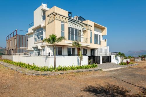Igatpuri Villa | ELIVAAS White House 4-BHK Villa with Panoramic Hill Views, Glass Room, Outdoor Pool & Dam nearby