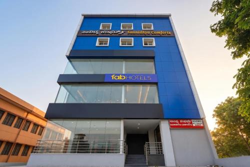 Kunigal Hotel | FabHotel Saanidhya Comforts - Tumkur Road