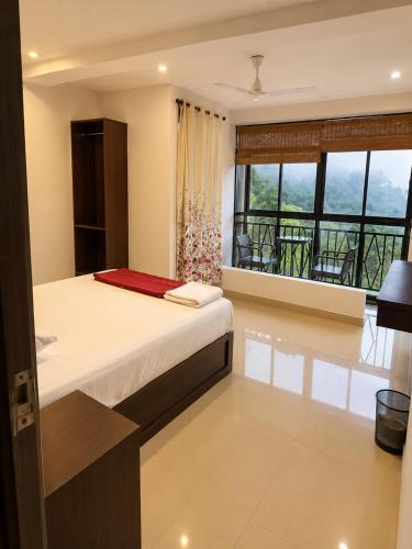 Devikolam Hotel | Grand Munnar Rooms
