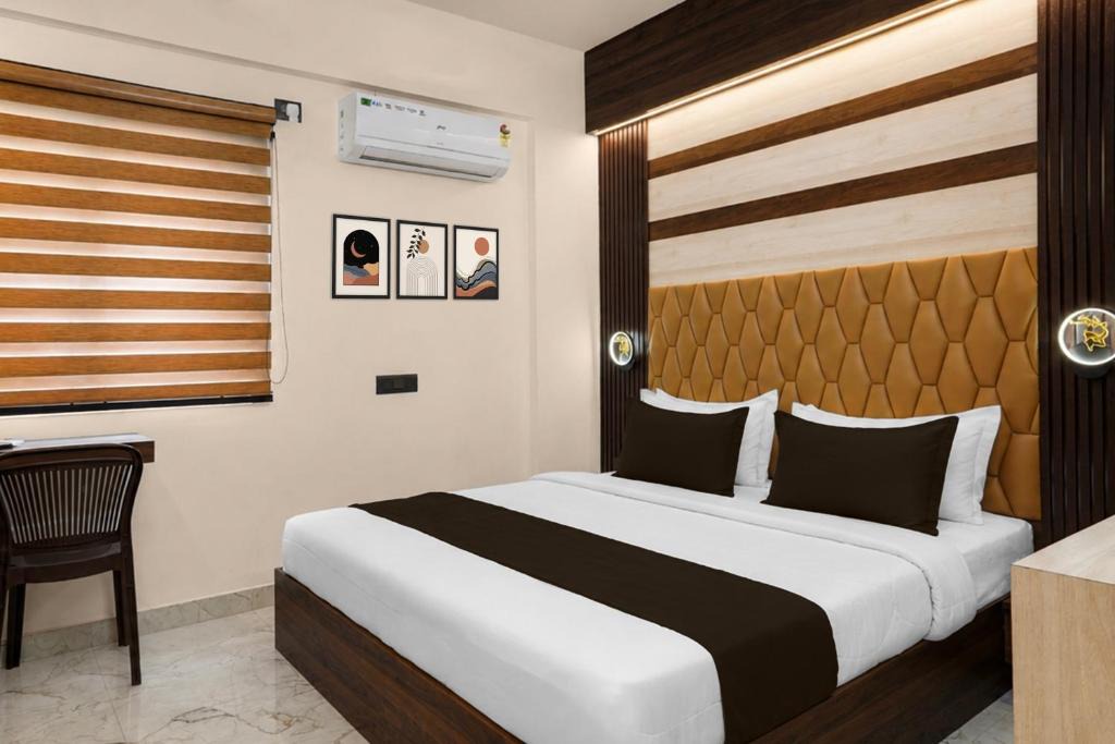 Palm Meadows Hotel | Hotel O Teja Luxe Suites