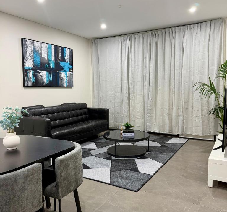 Lidcombe Apartment | Luxe 3BR Apartment Near Stadium Balcony, Parking & WiFi