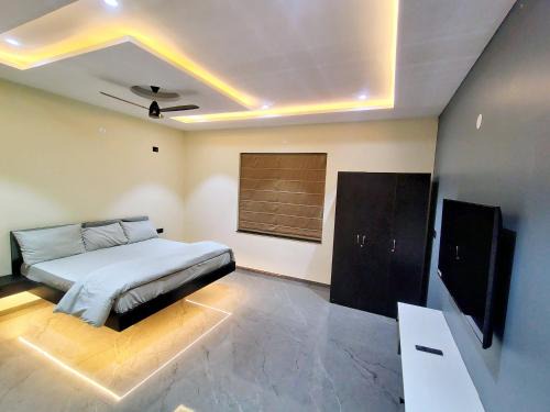 Hyderabad House | Luxe poolside farmhouse -J House