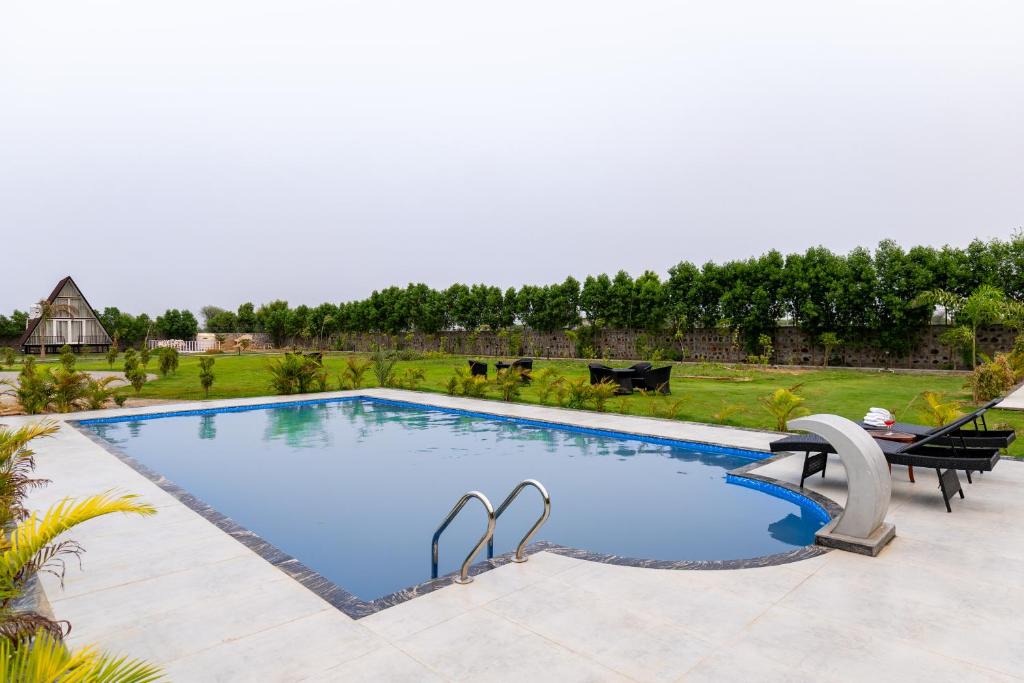 Faridabad Villa | Malik Farms Countryside Wooden Cottage on 2 Acre Estate with Shared Pool, Garden & Restaurant