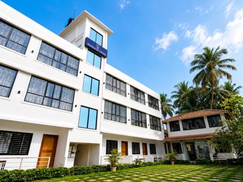 Morjim Hotel | Morjim Pride Hotel with Swimming Pool near Morjim Beach