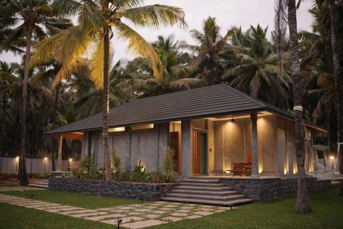 Pollachi House | Nature nest by own the rock