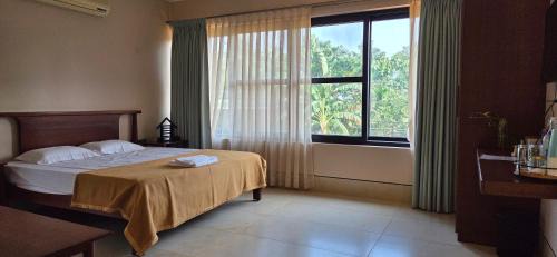 Tenkasi House | Nirmala's Farmhouse - The Blu room