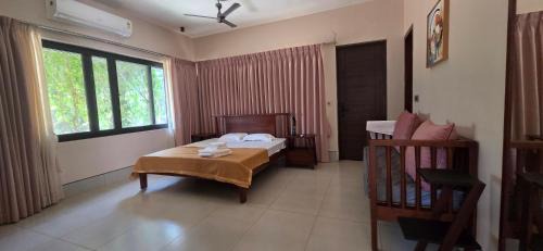 Tenkasi House | Nirmala's farmhouse - The Red room