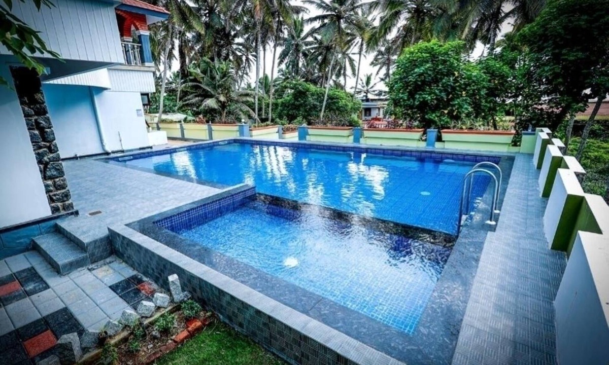 Poovar House | Ocean Queen Palace Poovar – Luxurious Queen Room with Private Balcony