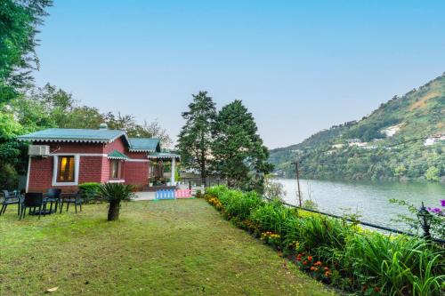 Bhimtal Villa | SaffronStays Gardens on the Lake - 2BR pet & elderly-friendly lakefront villa with lawns, bonfire & kitchenette near Nainital