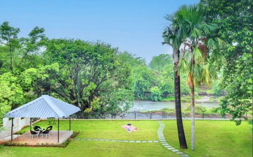 Gaulwadi Villa | SaffronStays Nilaya by the River - 3BR riverside villa with private pool, bonfire, BBQ & river views
