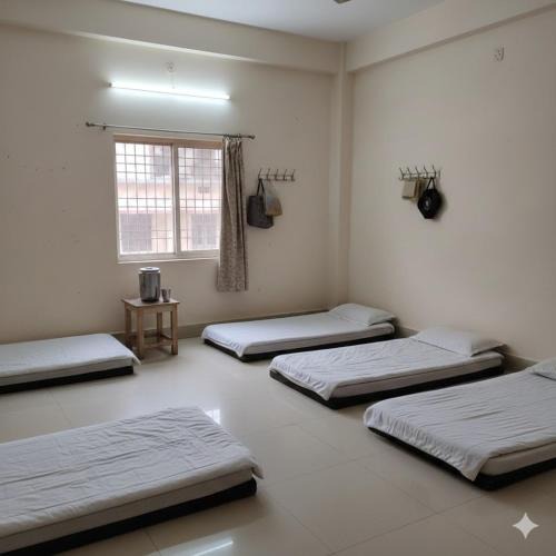 Jhusi House | Shri Ram Yatri Niwas