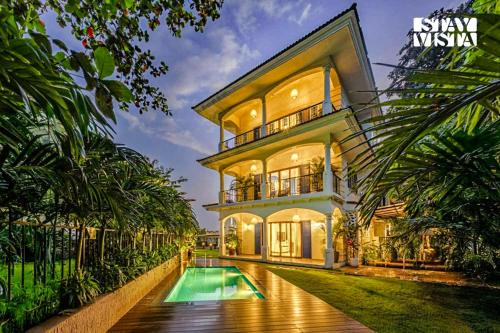 Saunta Vaddo Villa | StayVista at Arden Blu with Pool, Bar