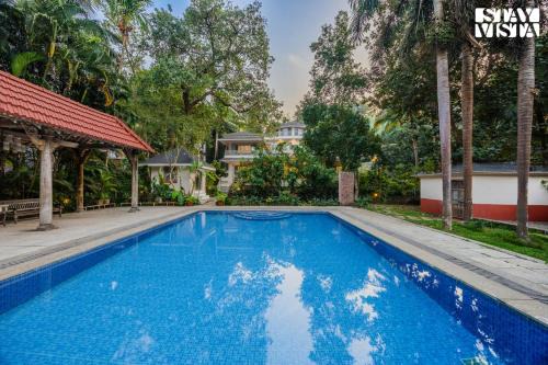 Ilhas Villa | StayVista at Casa Palacio with Pool, Lawn