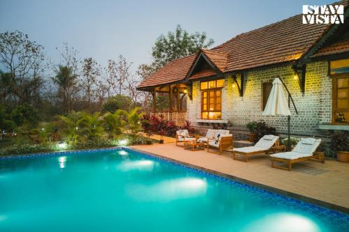 Sangavi Villa | StayVista at Orchard by the River with Bonfire, BBQ