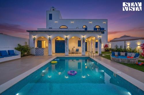 Gurugram Villa | StayVista at Santorini Villa with Pool, Lawn