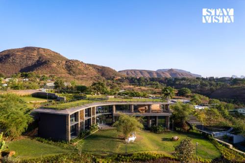 Nashik Villa | StayVista at The Earth Stone with Infinity Pool, Lawn