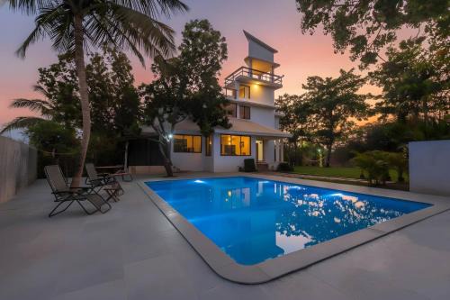 Vaijanath Villa | StayVista's Santoni Farms - Riverside Bliss with Pool, Orchard & Activities