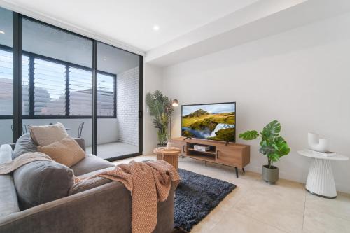 Marrickville Apartment | Sunlit 2BR Gem Parking Included