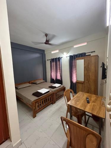 Kumaranalloor Hotel | TGM Inn