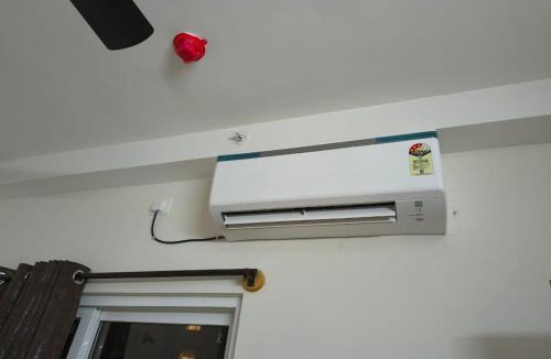 Bengaluru Apartment | 1 BHK with AC on 7th floor located near the Bengaluru Airport