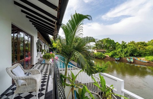 Alto de Porvorim Villa | A River Front Villa with Pool