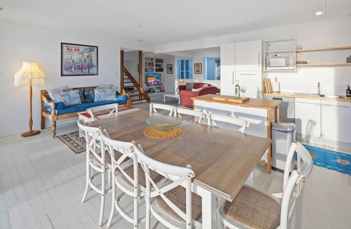 Scotts Head House | Absolute waterfront beach house with massive deck - family and dog friendly