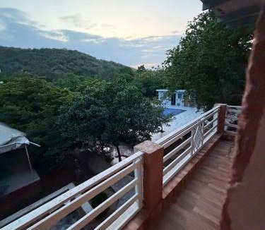 Faridabad House | Aravalli Hills golden farm, Luxury Tents & AC rooms with scenic views