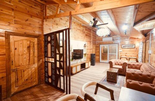 Chevella House | Arunam - A Royal Wooden Cottage & Pool Farmhouse