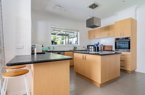 Rosebud House | Avenues Getaway ~ King beds, pet friendly and always happy guests.
