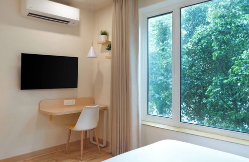 Gachibowli Hotel | Bloom Hotel - DLF Road Gachibowli