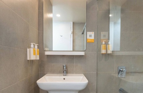 Gachibowli Hotel | Bloom Hotel - DLF Road Gachibowli