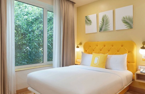 Gachibowli Hotel | Bloom Hotel - DLF Road Gachibowli