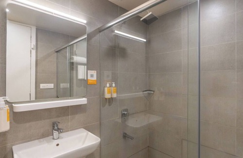 Gachibowli Hotel | Bloom Hotel - DLF Road Gachibowli