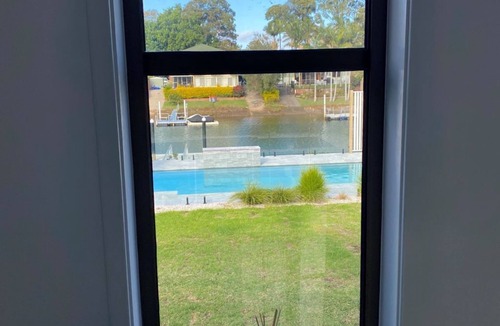 Port Macquarie House | Canal Waterfront Retreat Hosts 10 Pool & Spa