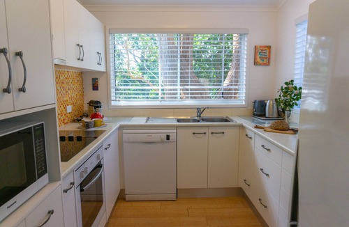 Macmasters Beach House | Castaway | Cosy-up by the fire | Opposite beach path | Pet friendly