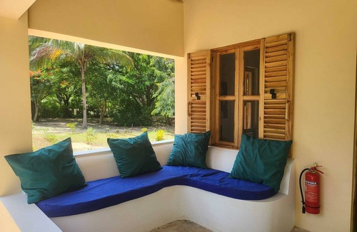 Pangani House | Comfortable beach villa, located directly by the sea, tropical garden