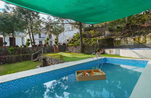 Nahan Hotel | ELIVAAS Stars and Windsongs with Shared Pool, Garden, Game Zone, Restaurant, & Hill Views Pet-friendly