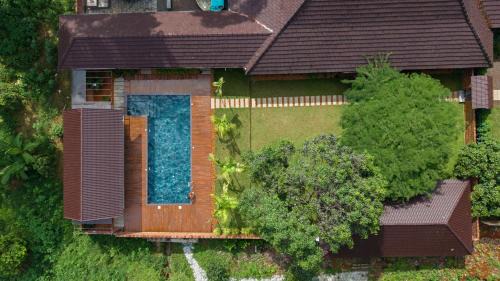 Kothamangalam Villa | ELIVAAS Tales By Tamarind 200 Year-Old 3 BHK Forest Villa with Pvt Pool, Garden, Gazebo, Backyard & Open-Air Shower Courtyard