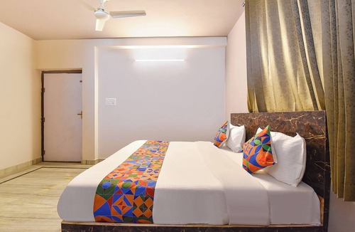 Mansarovar Hotel | FabHotel Blue Prime - Nr Suvira Hospital
