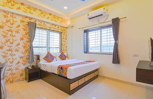 Paud Hotel | FabHotel Golden Heights