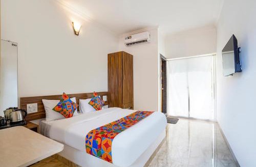 Morjim Hotel | FabHotel Palm Inn Resort