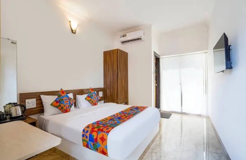Morjim Hotel | FabHotel Palm Inn Resort