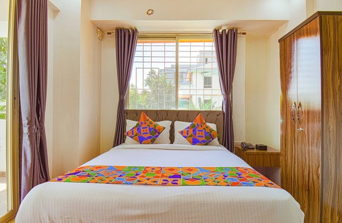 Mundhwa Hotel | FabHotel Red Velvet & Suites