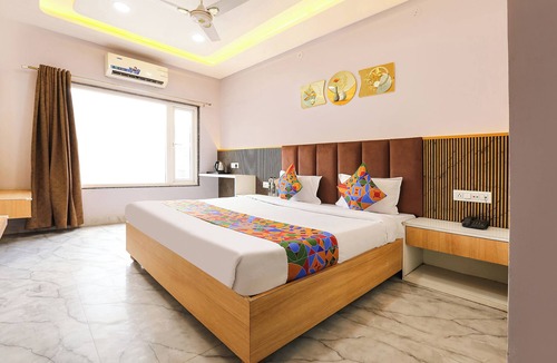 Rau Hotel | FabHotel Suraj Palace, Indore Airport