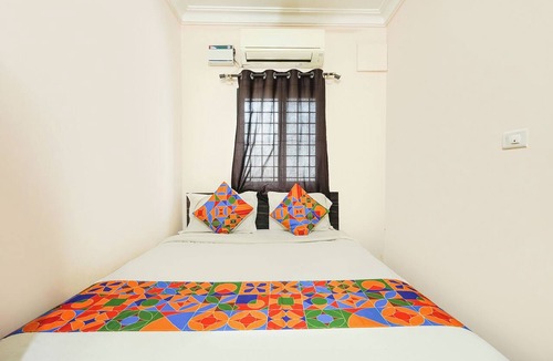 RR Nagar Hotel | FabHotel Utsav Palace Inn