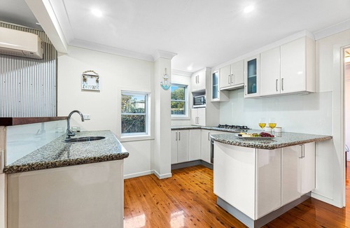 Potato Point House | Family-sized home with large deck - 200m to the beach
