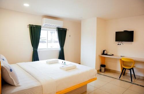 Adyar Hotel | Global Inn & Suites