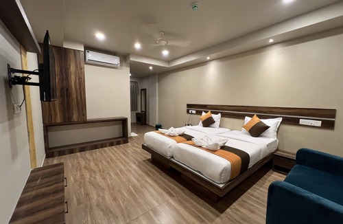 Electronics City Hotel | grand falcon