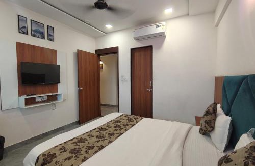 Ahmedabad Hotel | HOTEL EARTH INN, Subhash Bridge, RTO Circle, Ahmedabad