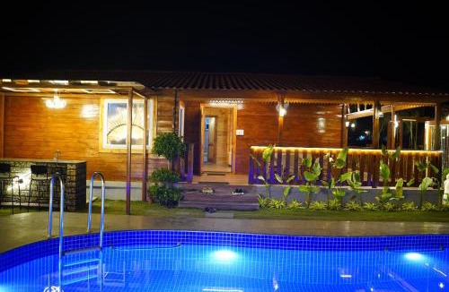 Chevella House | La Cabana, The Wooden Cottage